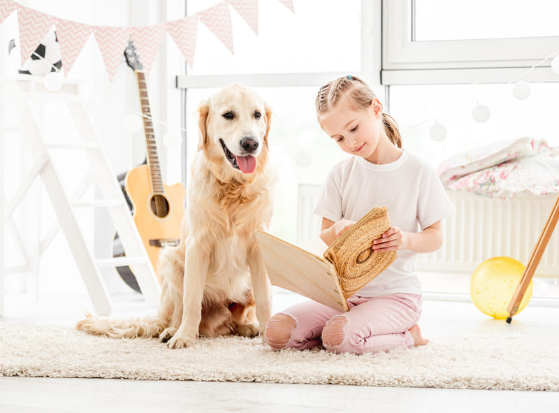 cute-little-girl-and-dog-reading